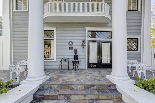 200 Westmoreland St, Houston, TX 77006 - entrance to property with a balcony, covered porch, and french doors