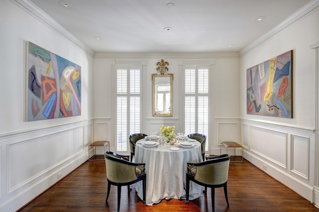 200 Westmoreland St, Houston, TX 77006 - dining room with a decorative wall, healthy amount of natural light, ornamental molding, dark wood-style floors, and a wainscoted wall
