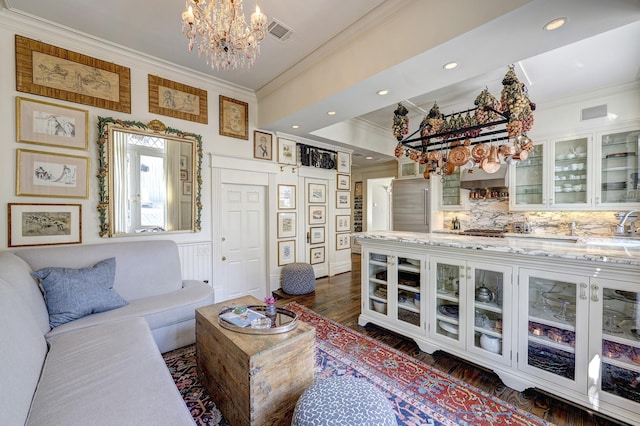 200 Westmoreland St, Houston, TX 77006 - living area featuring ornamental molding, a chandelier, dark wood finished floors, and recessed lighting