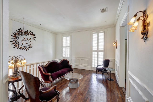 200 Westmoreland St, Houston, TX 77006 - living room with wainscoting, a decorative wall, wood-type flooring, and ornamental molding