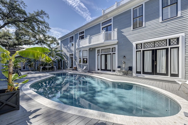 200 Westmoreland St, Houston, TX 77006 - swimming pool featuring french doors, a deck, and a patio area