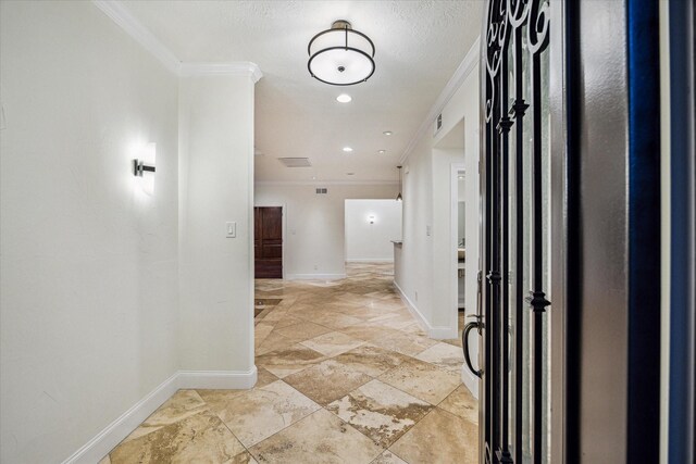 3224 Alabama Ct, Houston, TX 77027 - entrance foyer with ornamental molding, baseboards, and light stone finish floors