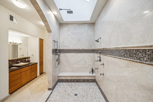 3224 Alabama Ct, Houston, TX 77027 - full bath featuring tiled shower and vanity