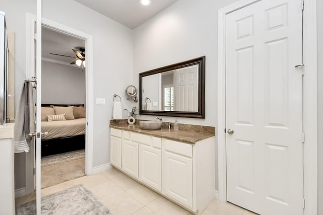 2223 Hilshire Trail Dr, Houston, TX 77080 - bathroom featuring vanity, ceiling fan, ensuite bath, baseboards, and tile patterned floors