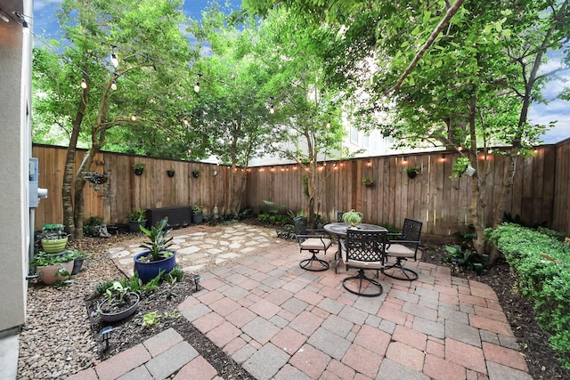 2223 Hilshire Trail Dr, Houston, TX 77080 - fenced backyard with a patio and outdoor dining space