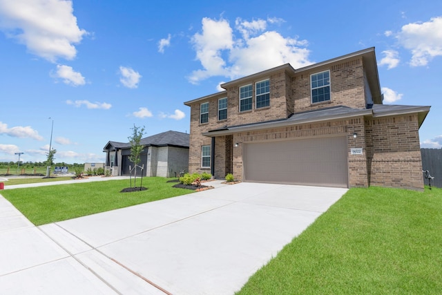 9022 Gull Cyn, Downs, Baytown, TX 77521 - view of front facade featuring brick siding, a front yard, concrete driveway, and an attached garage