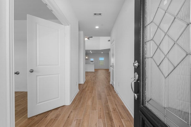9022 Gull Cyn, Downs, Baytown, TX 77521 - hallway with light wood finished floors, baseboards, and recessed lighting