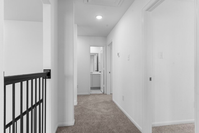 9022 Gull Cyn, Downs, Baytown, TX 77521 - hallway featuring carpet floors and baseboards