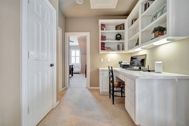 25606 Payton Chase Ct, Katy, TX 77494 - office area featuring light carpet, built in study area, and baseboards