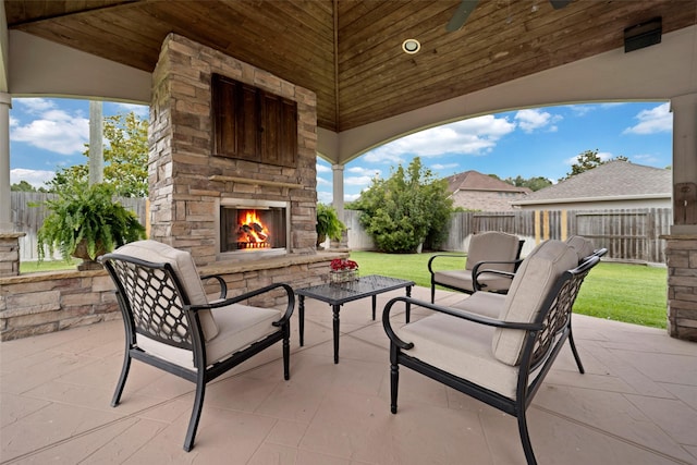 25606 Payton Chase Ct, Katy, TX 77494 - view of patio featuring an outdoor stone fireplace