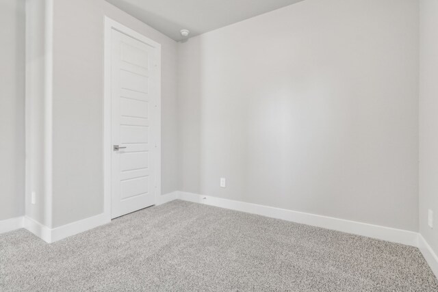 2010 Bluff Oak Ct, Conroe, TX 77304 - carpeted empty room featuring baseboards