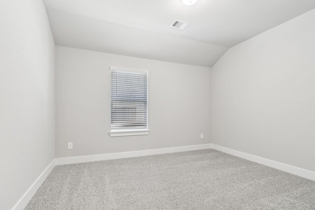 2010 Bluff Oak Ct, Conroe, TX 77304 - bonus room with vaulted ceiling, carpet, and baseboards