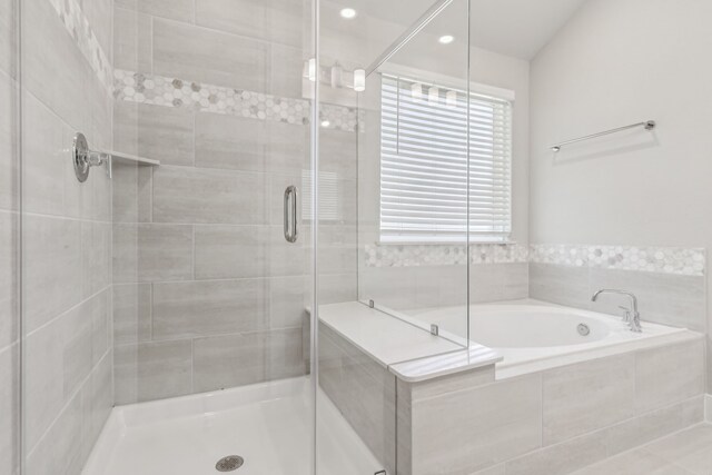 2010 Bluff Oak Ct, Conroe, TX 77304 - bathroom with a shower stall, a garden tub, and recessed lighting