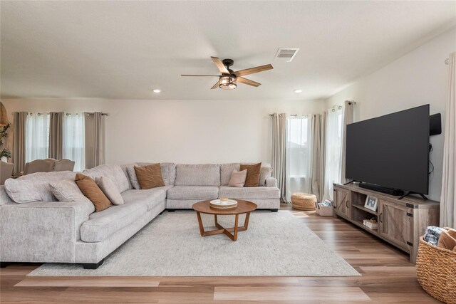 4335 Leyland Brook Ln, Houston, TX 77068 - living area featuring a ceiling fan, light wood finished floors, and recessed lighting