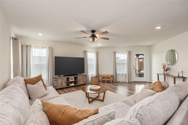 4335 Leyland Brook Ln, Houston, TX 77068 - living room with a ceiling fan, wood finished floors, and recessed lighting