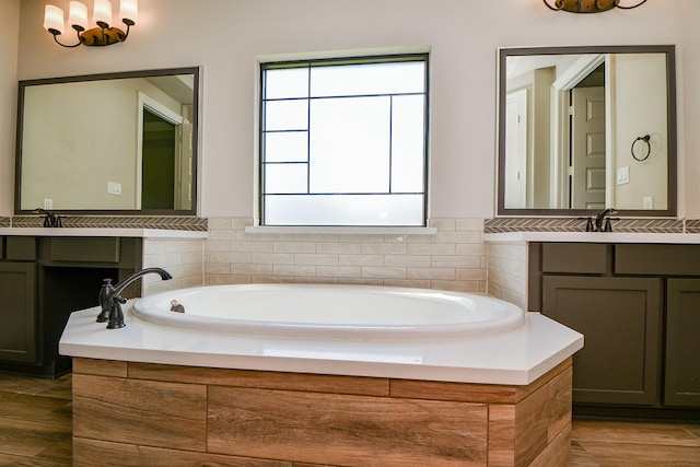 23402 Skylark Falls Trl, Katy, TX 77493 - bathroom featuring vanity and a garden tub