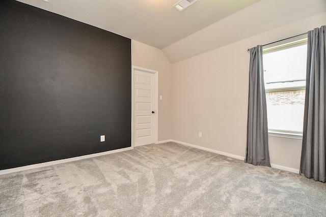 23402 Skylark Falls Trl, Katy, TX 77493 - spare room with carpet, vaulted ceiling, and baseboards