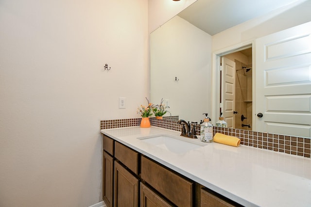 23402 Skylark Falls Trl, Katy, TX 77493 - bathroom with decorative backsplash, vanity, and a shower