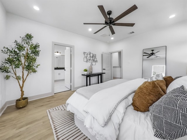 2410 Vaughn St Unit B, Houston, TX 77093 - bedroom with light wood-style floors, recessed lighting, connected bathroom, and a ceiling fan