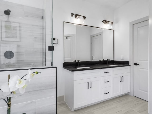 2410 Vaughn St Unit B, Houston, TX 77093 - full bathroom featuring double vanity and a tile shower