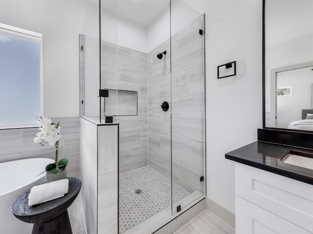 2410 Vaughn St Unit B, Houston, TX 77093 - full bathroom featuring a stall shower and vanity