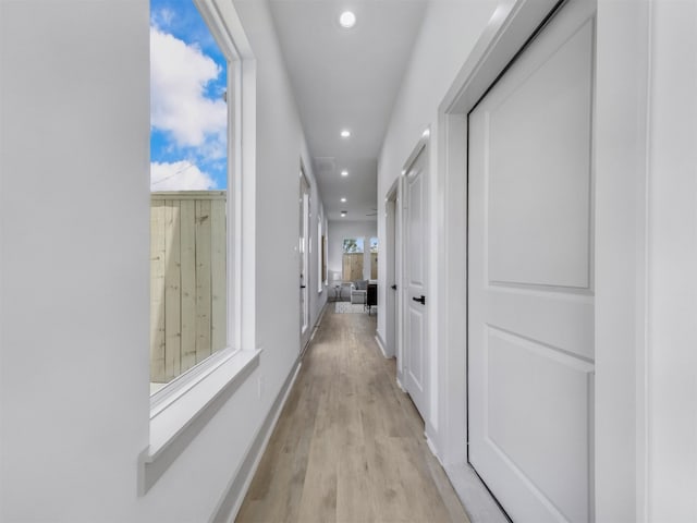 2410 Vaughn St Unit B, Houston, TX 77093 - hallway with recessed lighting and light wood-style floors