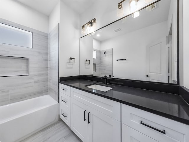 2410 Vaughn St Unit B, Houston, TX 77093 - bathroom with vanity and  shower combination