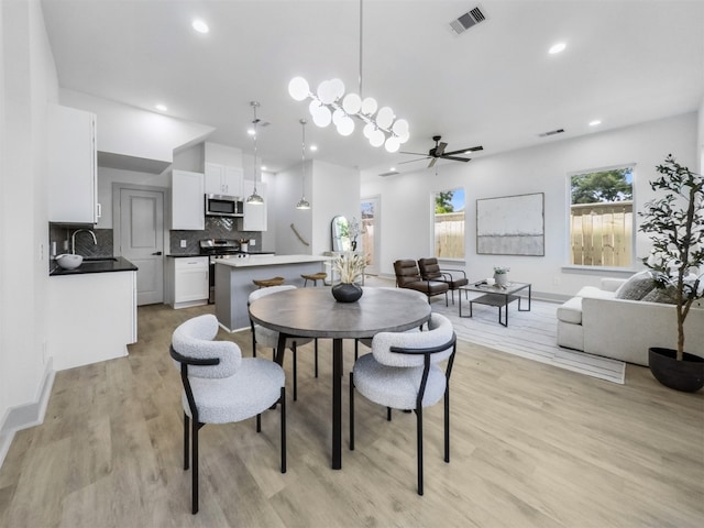 2410 Vaughn St Unit B, Houston, TX 77093 - dining room with ceiling fan, light wood-type flooring, and recessed lighting