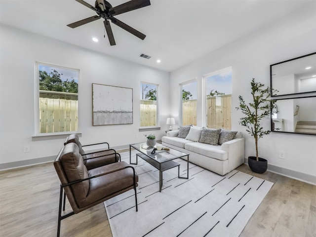 2410 Vaughn St Unit B, Houston, TX 77093 - living area with ceiling fan, wood finished floors, healthy amount of natural light, recessed lighting, and baseboards