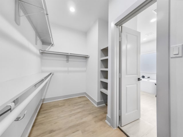 2410 Vaughn St Unit B, Houston, TX 77093 - spacious closet with light wood-style flooring