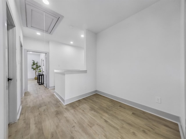 2410 Vaughn St Unit B, Houston, TX 77093 - spare room with attic access, light wood-style flooring, recessed lighting, and baseboards