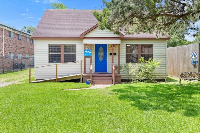 914 S Hill St, Alvin, TX 77511 - bungalow with a shingled roof and central air condition unit