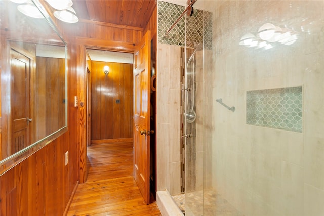 914 S Hill St, Alvin, TX 77511 - corridor featuring hardwood / wood-style flooring, wood walls, and wooden ceiling