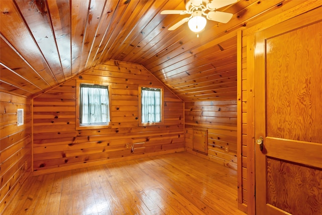 914 S Hill St, Alvin, TX 77511 - bonus room featuring a sauna / steam room, wooden walls, light wood-type flooring, vaulted ceiling, and ceiling fan