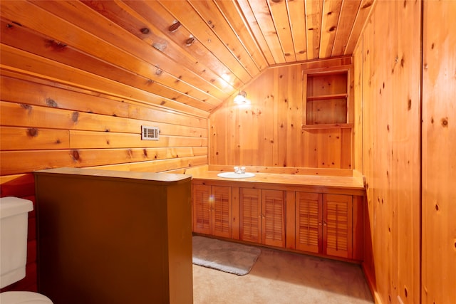 914 S Hill St, Alvin, TX 77511 - half bathroom featuring toilet, wooden walls, vaulted ceiling, wood ceiling, and vanity