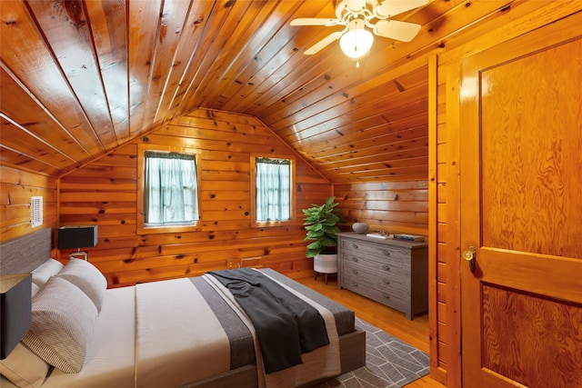 914 S Hill St, Alvin, TX 77511 - bedroom featuring wooden walls, wood finished floors, lofted ceiling, and wooden ceiling
