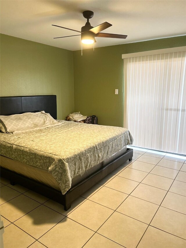 206 Plaza Verde Dr Unit D16, Houston, TX 77038 - bedroom featuring light tile patterned floors and ceiling fan