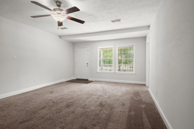 14790 N Tram Rd, Splendora, TX 77372 - carpeted empty room featuring a textured ceiling, ceiling fan, and baseboards