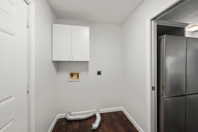 14790 N Tram Rd, Splendora, TX 77372 - laundry area featuring cabinet space, electric dryer hookup, baseboards, and wood finished floors