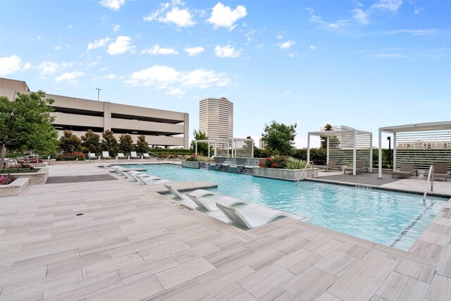 2047 Westcreek Ln Unit 1105, Houston, TX 77027 - community pool with a patio