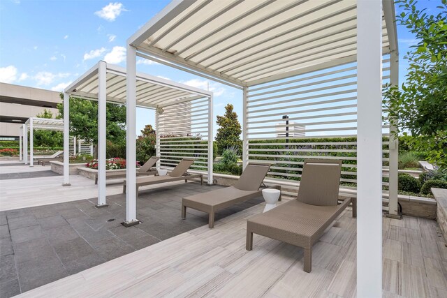 2047 Westcreek Ln Unit 1105, Houston, TX 77027 - view of patio with a pergola