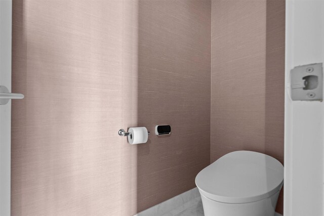 2047 Westcreek Ln Unit 1105, Houston, TX 77027 - bathroom featuring toilet