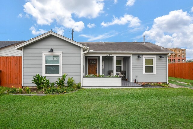 1927 Tabor St, Houston, TX 77009 - ranch-style house featuring a shingled roof