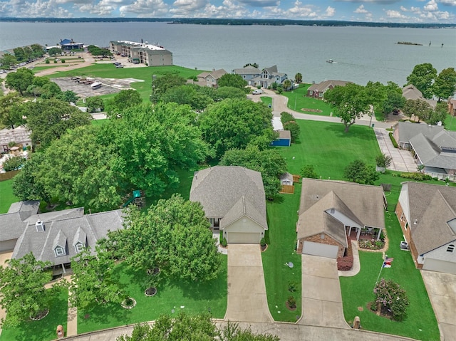 6978 Gentle Breeze Dr, Willis, TX 77318 - aerial perspective of suburban area with a nearby body of water
