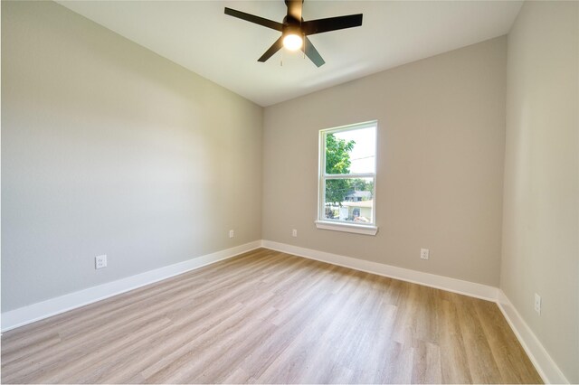 502 W Francis St, Baytown, TX 77520 - unfurnished room featuring light wood-type flooring, ceiling fan, and baseboards