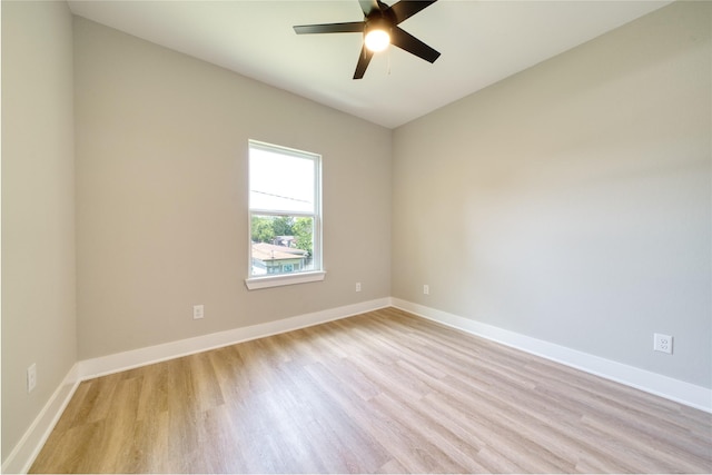502 W Francis St, Baytown, TX 77520 - empty room with light wood-style flooring, baseboards, and a ceiling fan