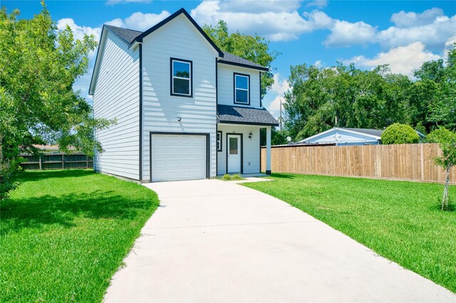 502 W Francis St, Baytown, TX 77520 - traditional home featuring a shingled roof, a garage, and concrete driveway