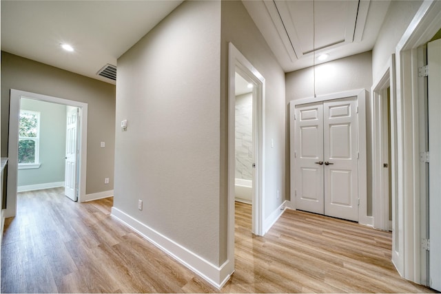 502 W Francis St, Baytown, TX 77520 - corridor with attic access, light wood finished floors, baseboards, and recessed lighting