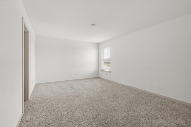 29231 Red Rocks Park Dr, Katy, TX 77494 - carpeted empty room with baseboards