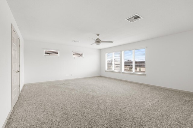 29231 Red Rocks Park Dr, Katy, TX 77494 - carpeted spare room featuring a ceiling fan and baseboards